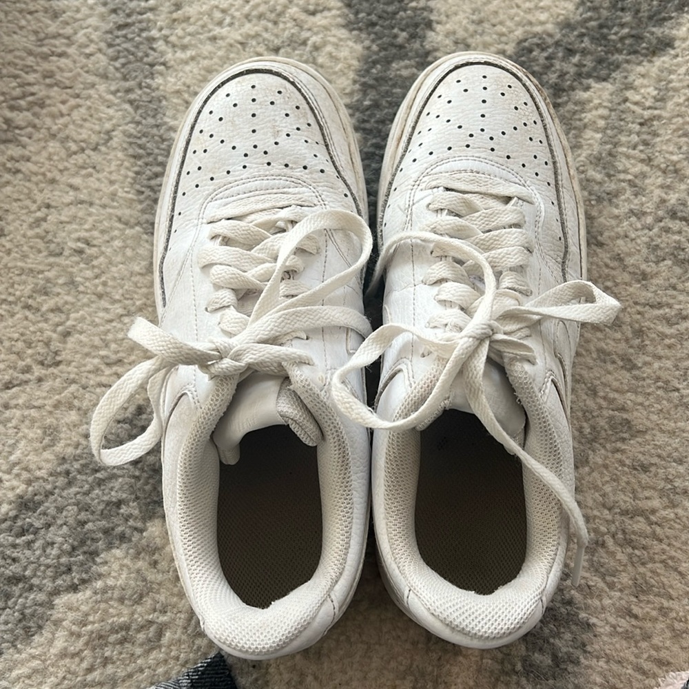 White Nike shoes *not air forces but look similar *